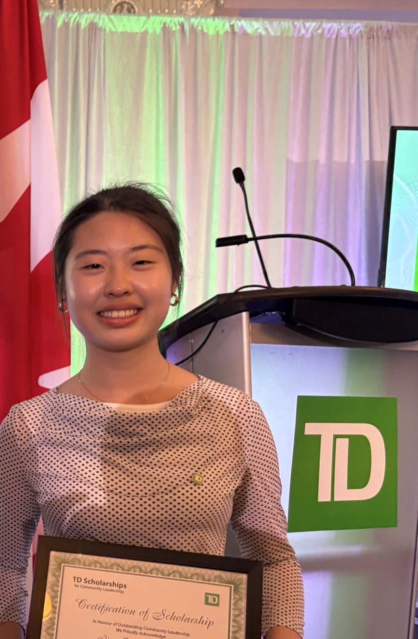 Lisa receiving recognition at the TD Scholarships event